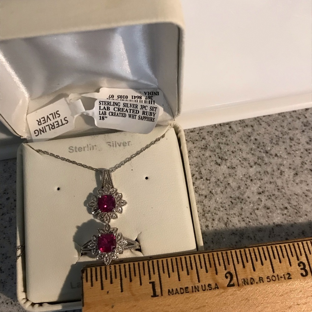 Sterling Silver Matching necklace and ring lab created ruby and white sapphires.